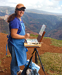 Artist Helen Turner painting en plein air on Kauai