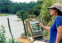 Artist Helen Turner painting en plein air on Kauai